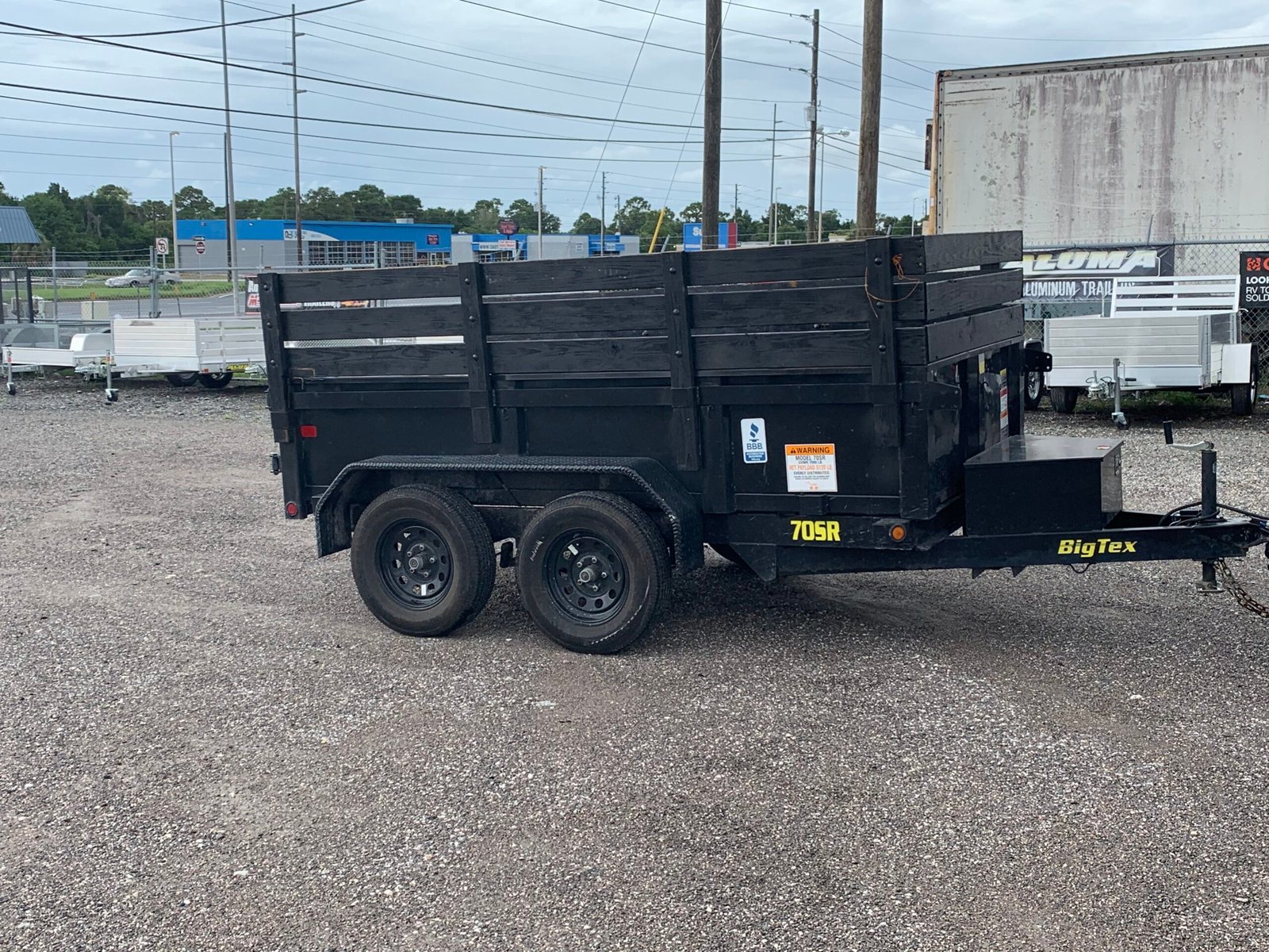 Empty Junk Busters dump trailer ready for a Tampa Bay cleanup or debris project