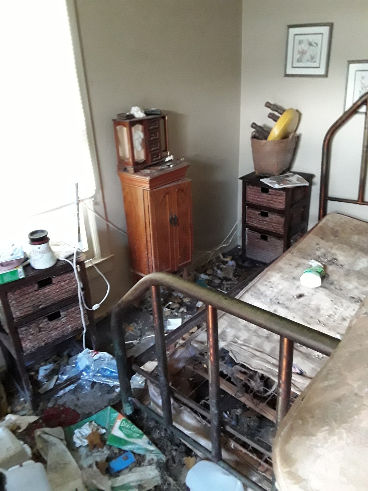 Bed frame dresser and household items before Junk Busters furniture removal in Tampa Bay